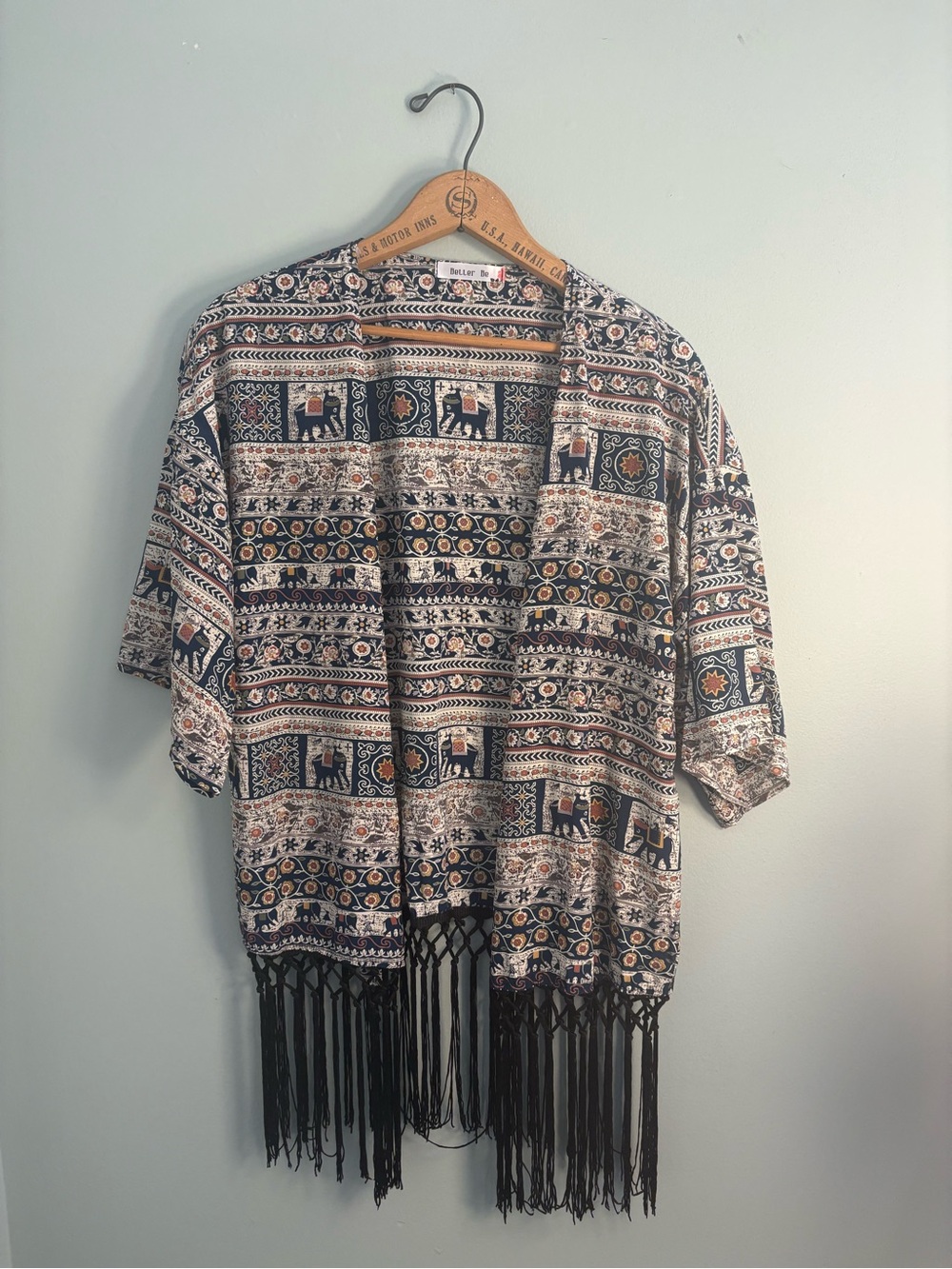 Better Be Elephant fringe cardigan and or wrap.